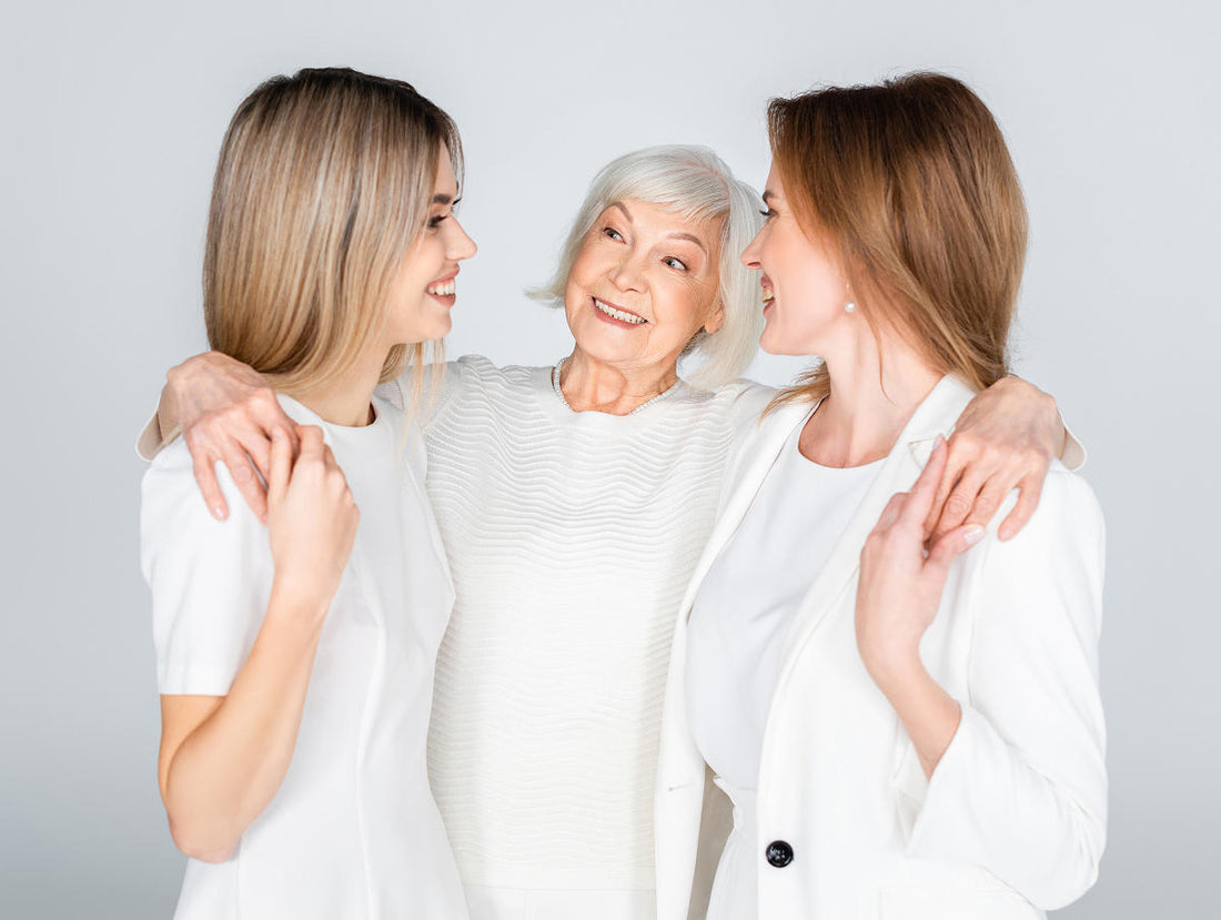 People of various ages with their arms around each other