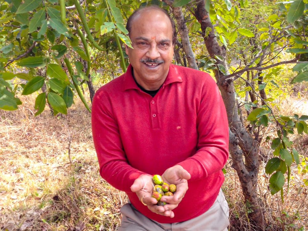 Jitender Sodhi, Managing Director of India, holding ingredients