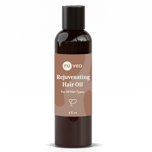 Rejuvenating Hair Oil bottle front by ruved herbal supplements and ayush herbs